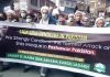 Shia Muslims taking out a protest rally in Kargil on Saturday. —Excelsior/Basharat Ladakhi