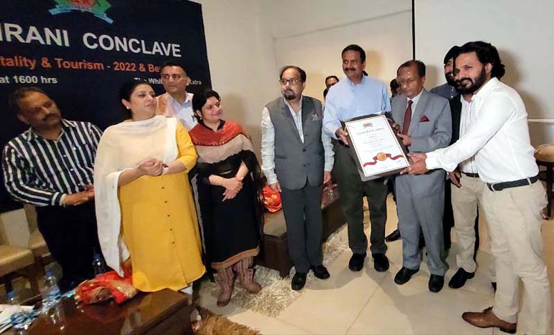Principal Secretary Industries, Ranjan Prakash Thakur giving award of best Restaurant (Katra) to MADHUBAN Managing Director, Sumit Partap Gupta at sixth HRANI Conclave held in Katra.