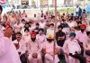 Cong leader Raman Bhalla addressing public meeting at Bhour Camp in Jammu on Monday.