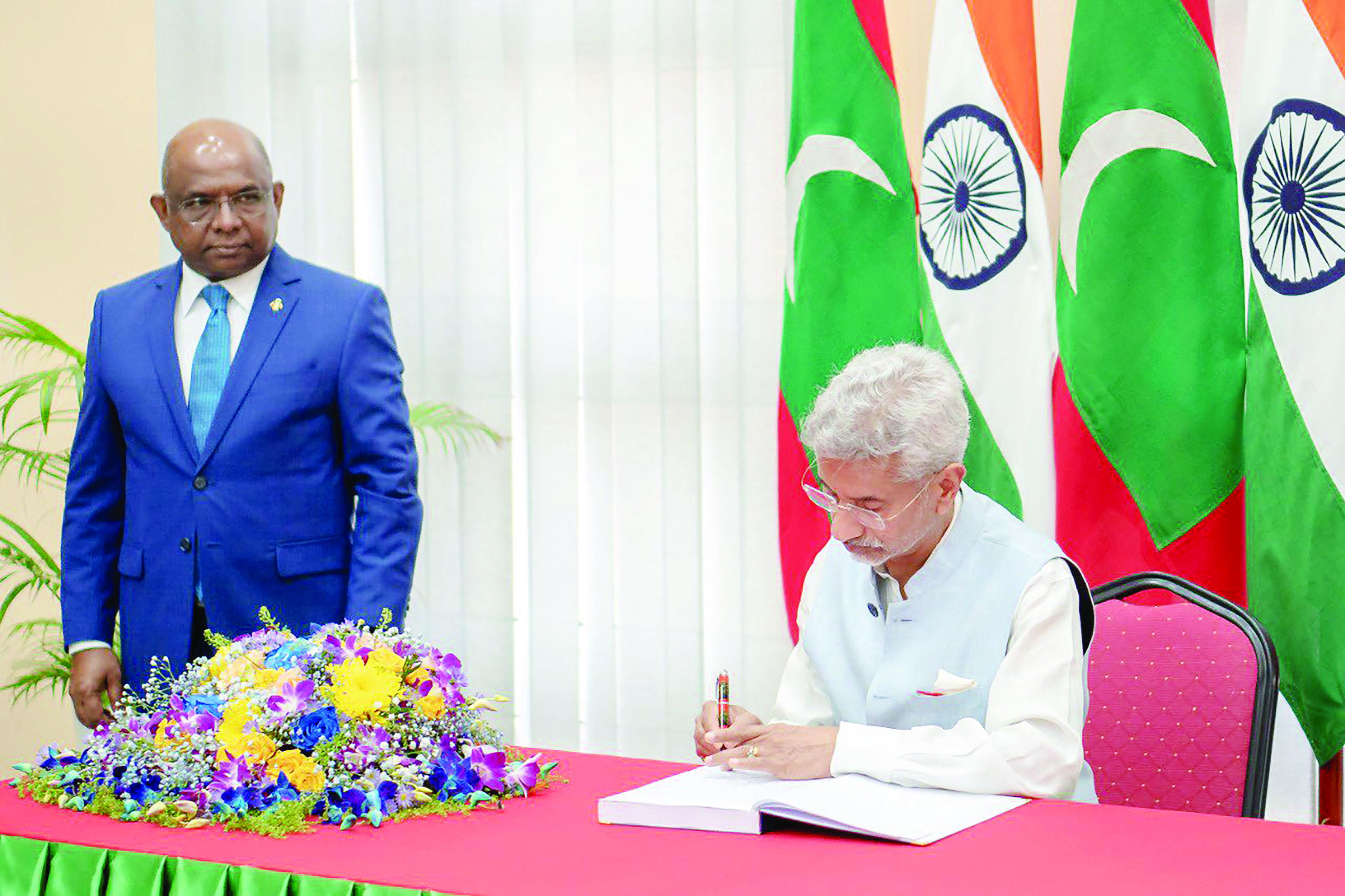 External Affairs Minister S Jaishankar writing in visiters book during the inauguration of National College for Policing and Law Enforcement (NCPLE) in Addu City on Sunday. (UNI)