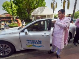 Union Road Transport and Highways Minister Nitin Gadkari arrives at Parliament by a green hydrogen-powered car, during the second part of the Budget Session, in New Delhi.