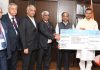 AK Singh, CMD, NHPC handing over interim dividend payout advice to RK Singh, Union Minister of Power, New and Renewable Energy.