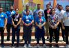 Winners dislpaying medals while posing for a group photograph along with officials of Powerlifting Associations at Jammu.
