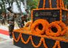 An Army official paying homage to martyrs at War Memorial Hamirpur in Akhnoor on Tuesday.