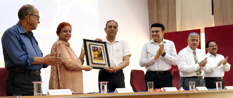 Dr Renu Gupta, Chairperson MIER presenting memento to Rohit Kansal during Placement Day celebrations at MIET.