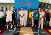 CRPF officials and participants during inaugural ceremony of weightlifting competition at Sidhra, Jammu on Wednesday.