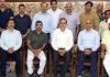 Newly promoted DySPs posing for a group photograph alongwith office bearers of Arun Sharma Sports & Social Welfare Trust during a function at Jammu on Wednesday.