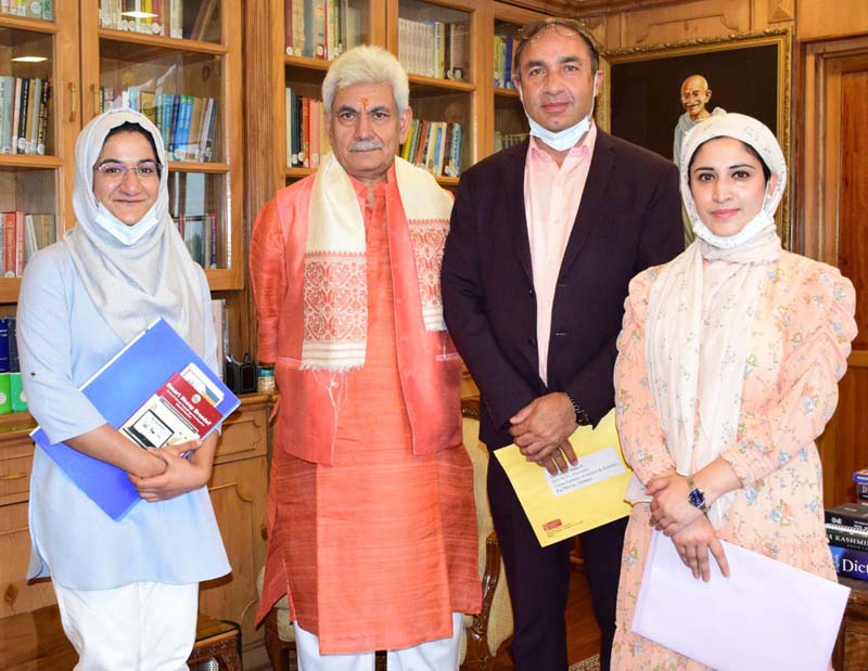 Lt Governor with national award winner students of SKUAST Kashmir.