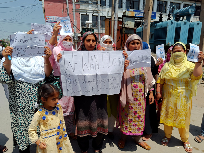 Family of a missing man during a protest in Srinagar on Friday. -Excelsior/Shakeel