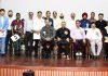 Awardees of Prof Chaman Lal Gupta Khel Ratna Award posing for a group photograph alongwith dignitaries at Jammu on Friday. —Excelsior/Rakesh