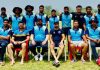 Jubilant JKCA A5 team posing for a group photograph alongwith coach at Country Cricket Stadium Gharota on Monday.