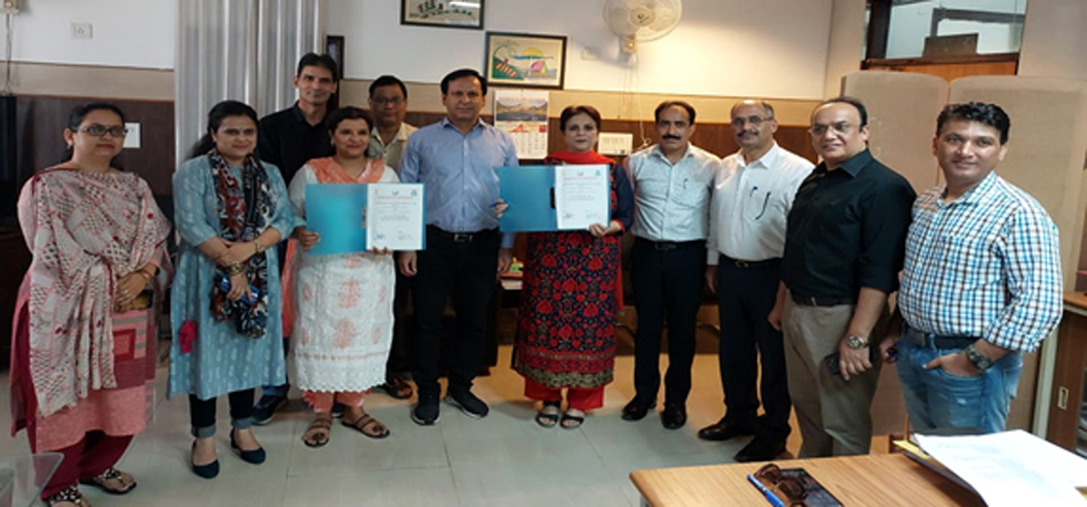 Representatives from Govt Polytechnic & DIC Jammu after signing MoU on Saturday.