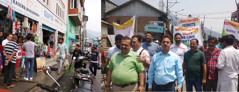 Shops open in Bhaderwah during curfew relaxation (left) while people take out peace rally in Kishtwar on Wednesday (right). —Excelsior/Tilak Raj