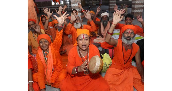 Sadhus sing bhajans and chant ‘bham bham bhole’ as they reach Purani Mandi Ram Mandir in Jammu city ahead of Shri Amarnath yatra. — Excelsior/Rakesh