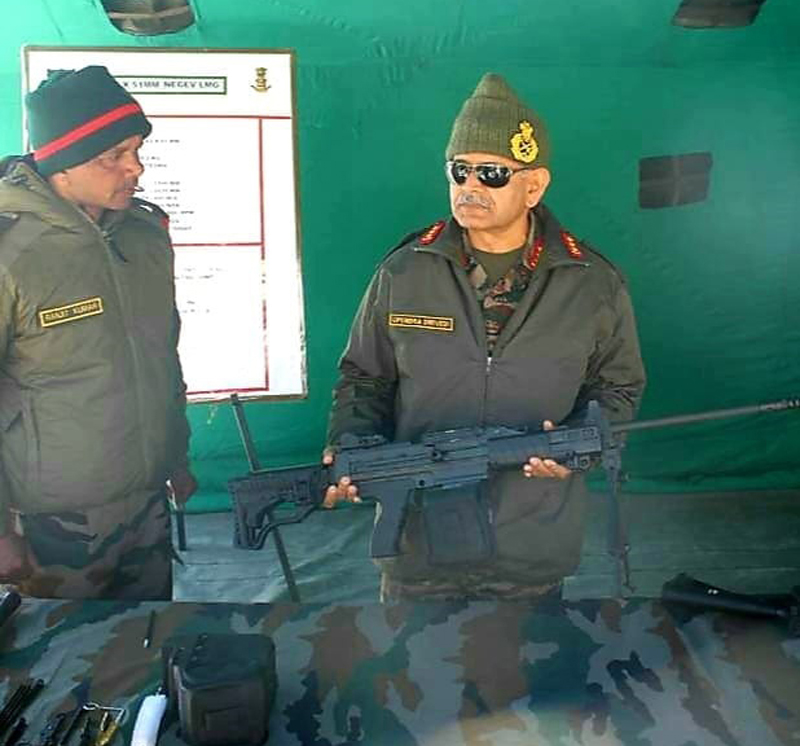 Northern Command chief Lt Gen Upendra Dwivedi inspecting a weapon on a forward post in LAC in Eastern Ladakh.
