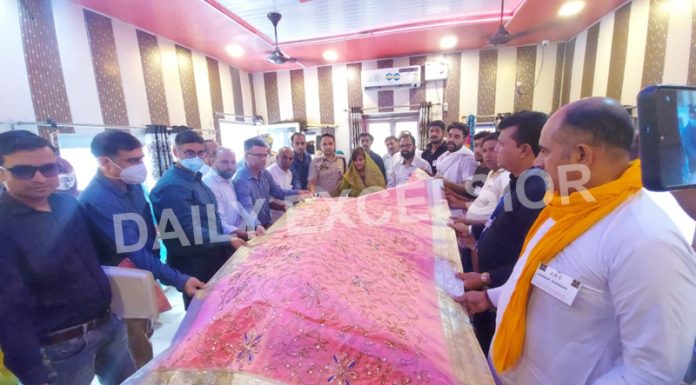 DC Samba, Anuradha Gupta and senior officers offering Chadar to Baba Chamliyal on the occasion of annual fair on Thursday. -Excelsior/ Nischant