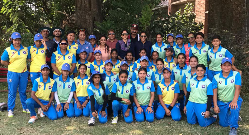 Players posing for a group photograph along with JKCA members and chief selector at Jammu University on Friday.