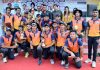 Jubilant JKCA’s Orange team posing alongwith Div Com Ramesh Kumar, Umran Malik and other dignitaries at GGM Science College Hostel Ground in Jammu.