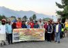 Officials of Kashmir University and participants during flagging off inter-college race at Srinagar on Tuesday.
