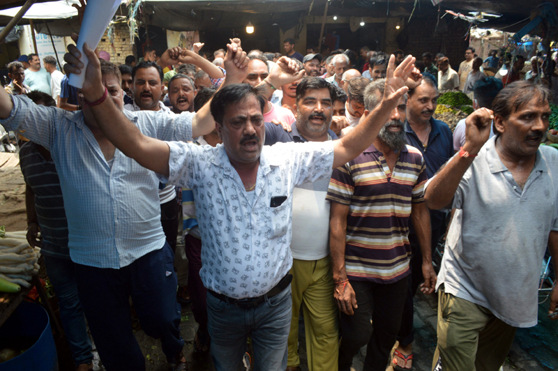 Sabzi Mandi area shopkeepers protesting on Wednesday. -Excelsior/Rakesh