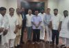 AAP leaders from J&K posing with Delhi CM Arvind Kejriwal at his office in New Delhi.