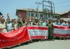 Kerosene dealers staging protest near Press Enclave, Srinagar. -Excelsior/Shakeel