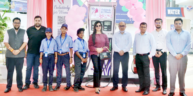 HPCL team members pose for a group photograph at launch of fuelling point exclusively for women in Gandhi Nagar.