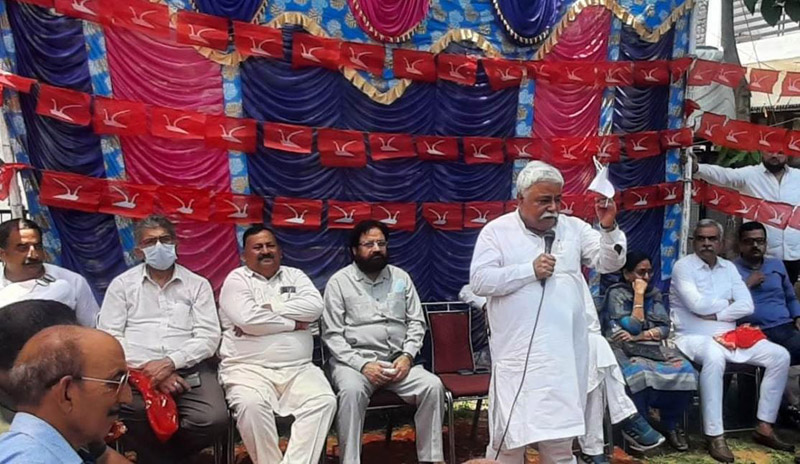Senior NC leader Ajay Sadhotra speaking at a public meeting in Jammu.