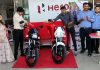 Dignitaries during launching of new Splendor Plus XTEC at Tawi Automobiles Jammu on Tuesday.