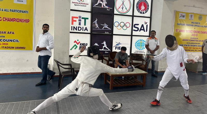 Players in action during the Fencing Championship at MA Stadium in Jammu on Wednesday.