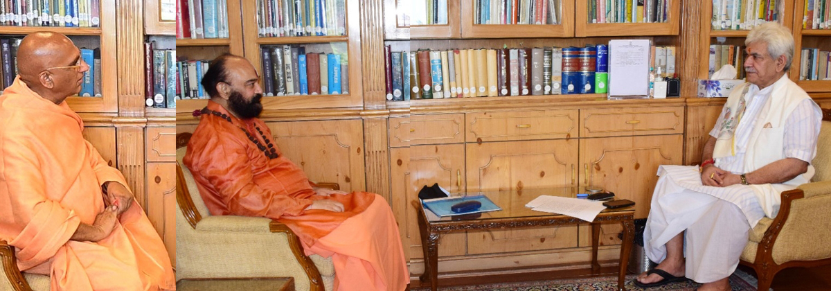 LG Manoj Sinha during meeting with Swami Avdheshanand and Mahant Deepandra Giri at Srinagar.
