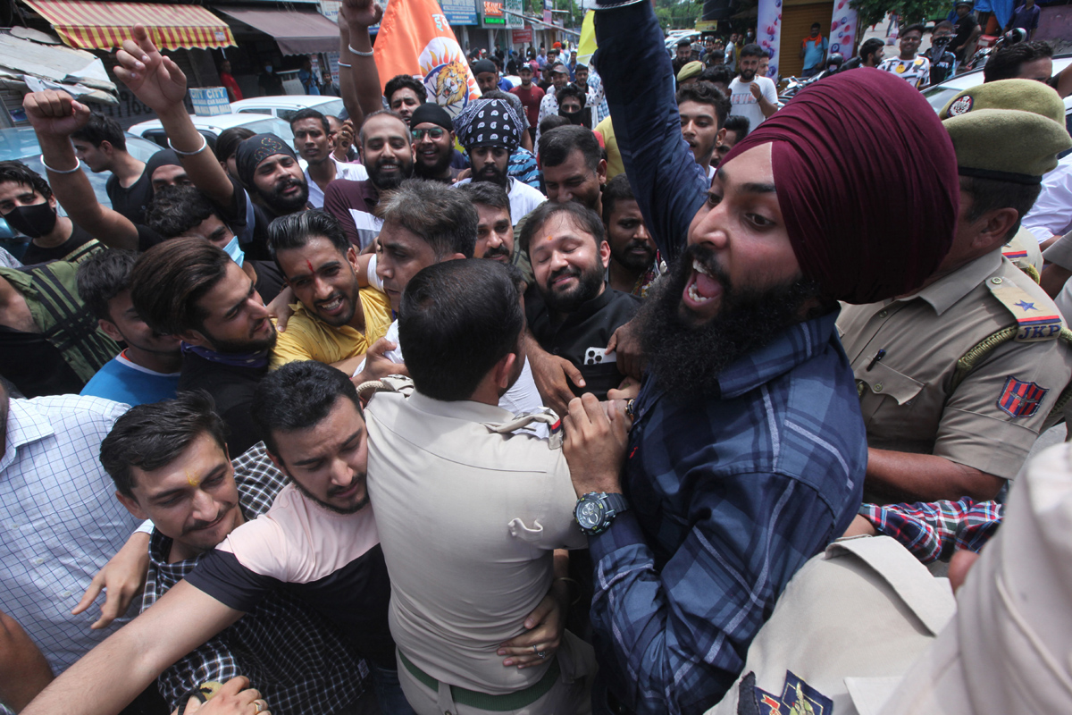 Ankur Sharma leading IkkJutt Jammu protest on Sunday. -Excelsior/Rakesh