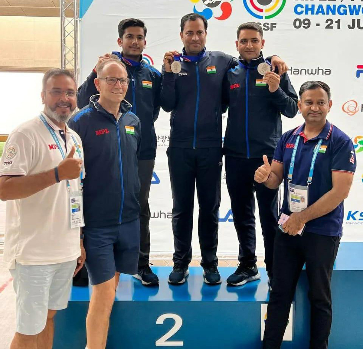 Chain Singh along with other shooters displaying Silver medals at Changwon in South Korea on Sunday.