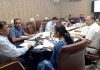 ACS R K Goyal chairing a meeting.