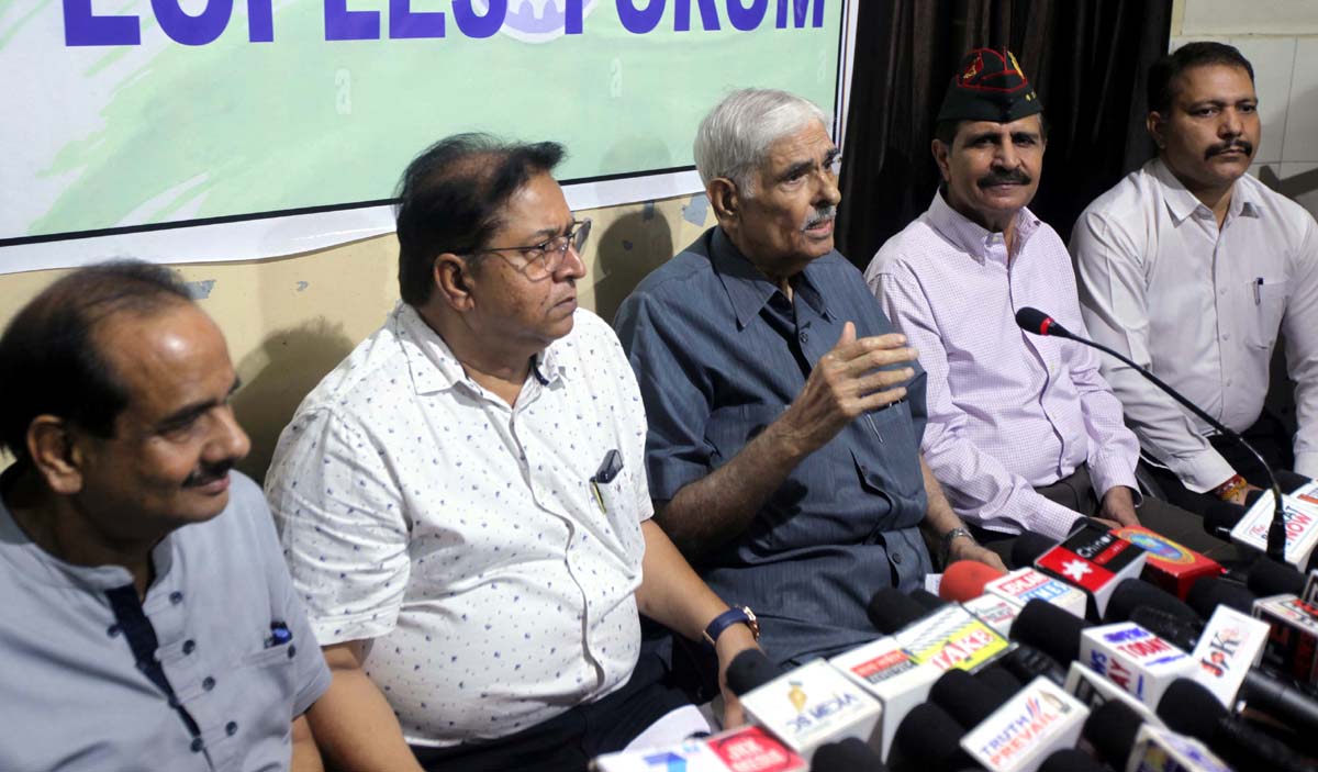 JKPF president Ramesh Sabharwal and other members during a press conference at Jammu on Friday. -Excelsior/Rakesh