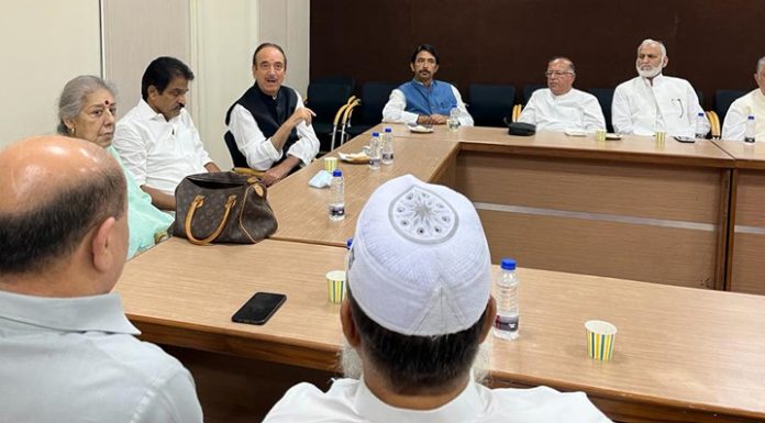 Senior AICC leaders K C Venugopal, Ambika Soni and Ghulam Nabi Azad at a meeting with senior JKPCC leaders in New Delhi on Wednesday.