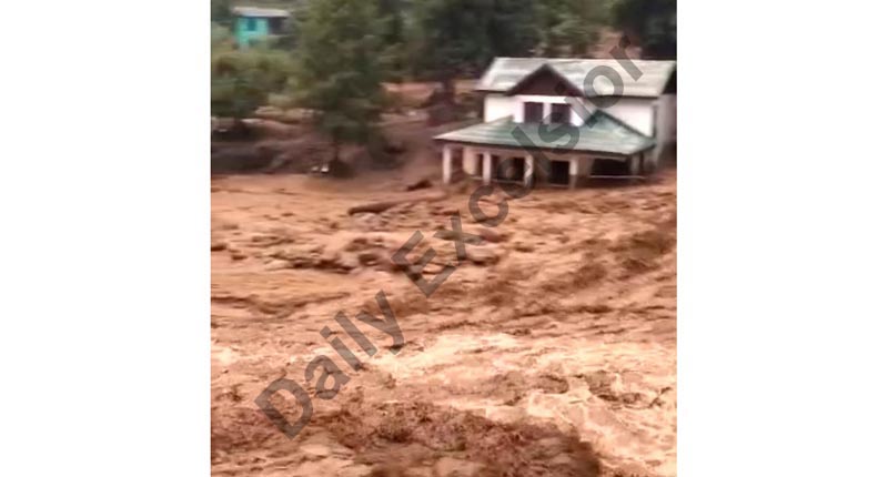 Flash flood in Kahra Nallah after cloudburst in upper reaches of Doda on Wednesday. —Excelsior/Tilak Raj