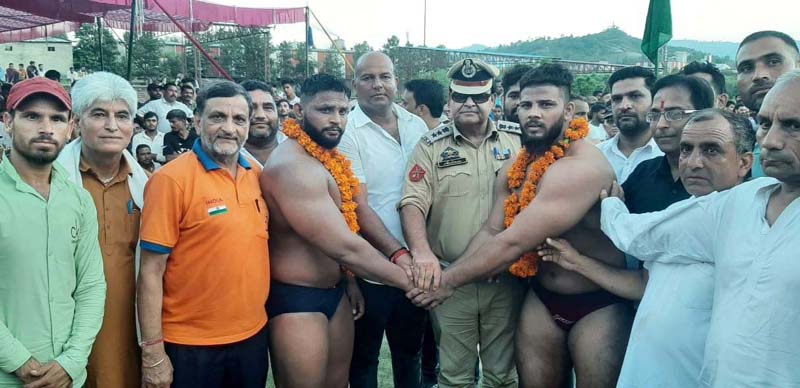 Wrestlers being introduced by the dignitaries at Udhampur on Tuesday.