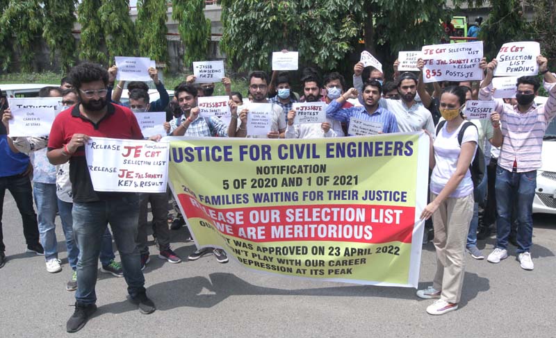 Unemployed Civil Engineers staging protest against JKSSB authorities at Press Club in Jammu on Tuesday. -Excelsior/Rakesh