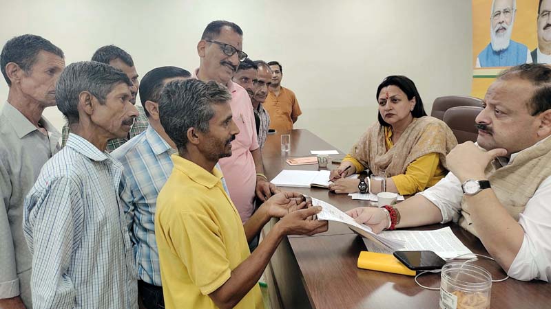 BJP leaders listening public grievances at Party Headquarter, Trikuta Nagar on Thursday.