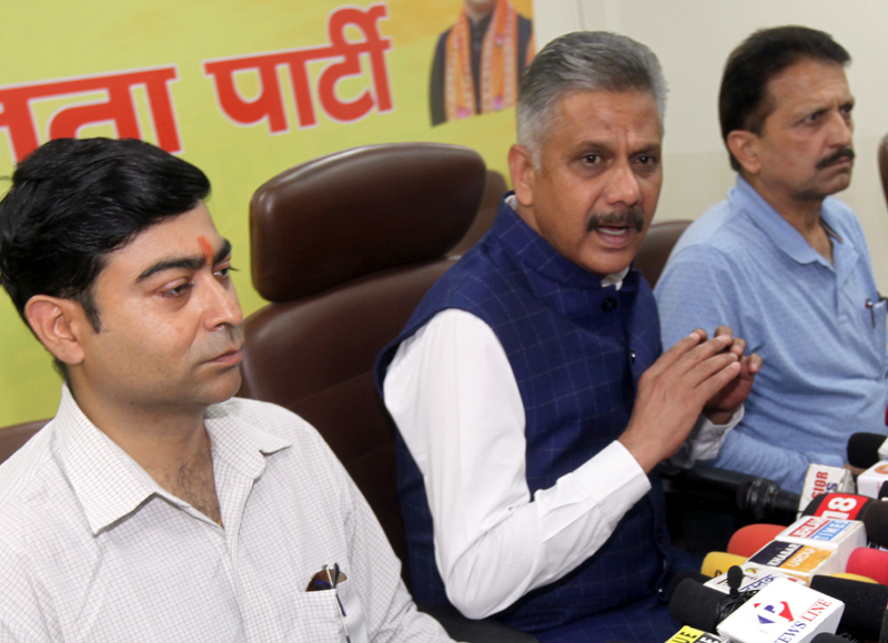Abhinav Sharma addressing a press conference at BJP headquarters in Jammu on Monday. —Excelsior/Rakesh