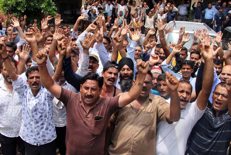 PHE workers staging protest demonstration at BC Road office of Chief Engineer in Jammu on Tuesday. -Excelsior/Rakesh