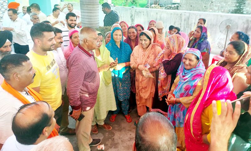 Former Minister Ch Sukhnandan listening problems of people in village Garhi in Bhalwal constituency on Tuesday.
