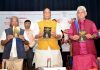 Deputy Chairman of Rajya Sabha Harivansh Narayan Singh, Defence Minister Rajnath Singh and J&K Lt Governor Manoj Sinha launching a book 'The Architect of the New BJP' - How Narendra Modi Transformed the Party, authored by Ajay Singh in New Delhi on Monday. (UNI)