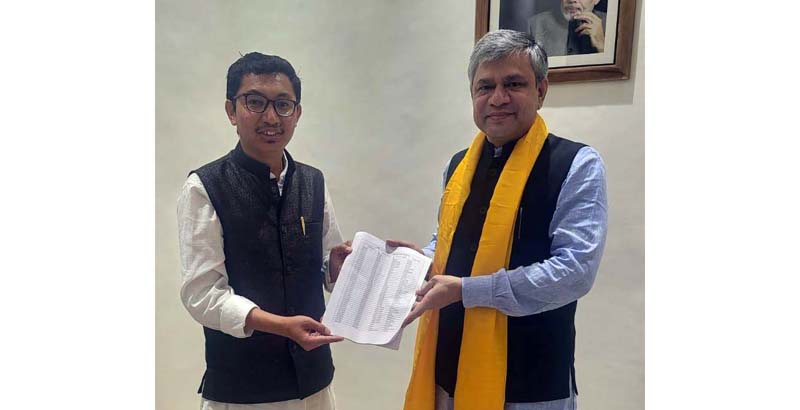 Union Minister Ashwini Vaishnaw handing over list of villages to Ladakh MP Jamyang Namgyal in New Delhi.