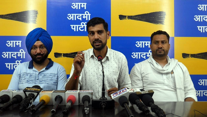 AAP leaders addressing a press conference at Jammu on Wednesday.