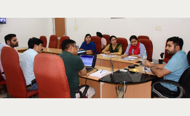 Director Information Akshay Labroo chairing a meeting at Jammu.