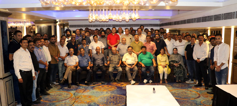 Participants posing for photograph after General Body Meeting of Jammu Pharmaceutical Distributors Association.