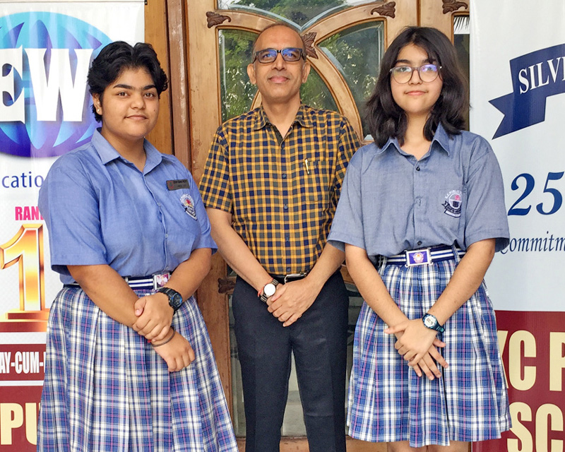 Winners posing with school principal, Amarendra Mishra in the school premises at Jammu on Tuesday.