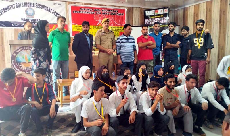 Winners posing for a group photograph along with dignitaries at Govt PG College Rajouri on Saturday.